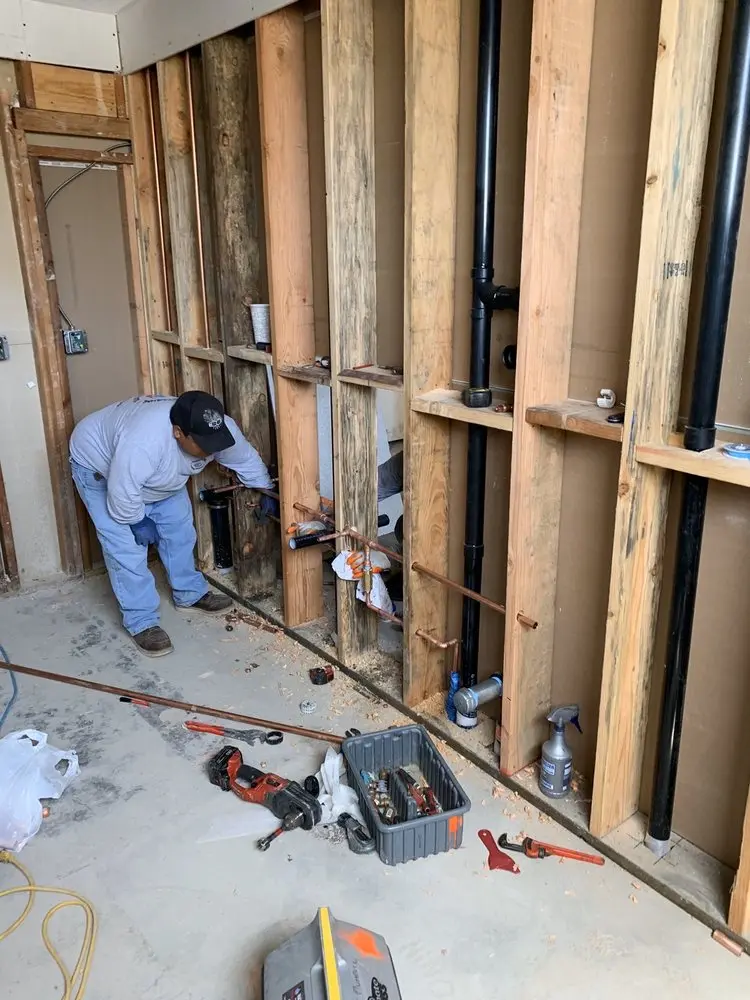 Commercial rough-in plumbing for Water Heater Replacement in Roosevelt Place East